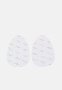 Silicone shoe inserts, white with a smooth texture, featuring a repeated "love my MAGIC" print in light rose. Designed in a rounded shape.