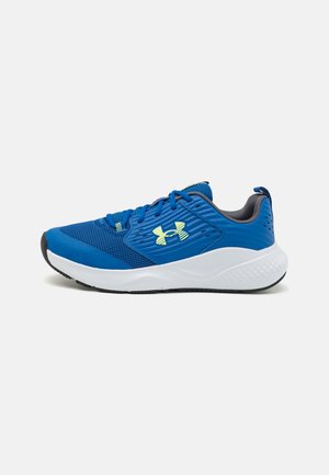Blue athletic shoes with a textured design, featuring a white sole and black accents, secured by blue laces and a cushioned collar.