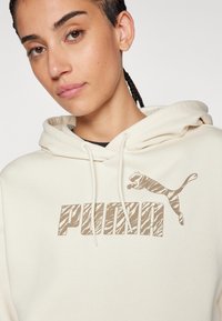 Puma ANIMAL HOODIE  - Jersey con capucha - alpine snow