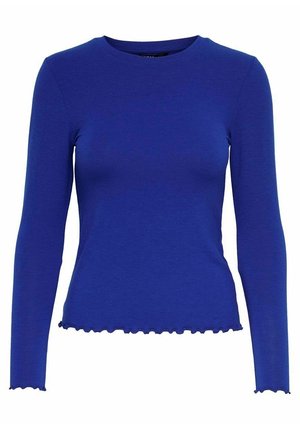 Chemise bleue cintrée à manches longues avec col rond et bords volantés aux manches et à l'ourlet, présentée sur fond blanc.