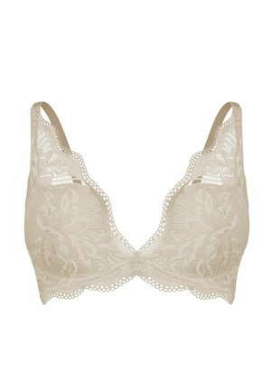 Beżowy koronkowy biustonosz z kwiatowym wzorem, falistymi krawędziami i regulowanymi ramiączkami, zaprojektowany dla lekkiego podparcia i dekoracyjnego noszenia.