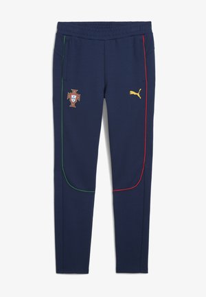 Jūras spēku poliestera bikses ar zaļām un sarkanām sānu akcentiem, elastīgu jostu un izšūtu Portugāles ģerboni uz kreisā svara.