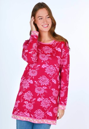 Langarm-Tunika in leuchtendem Pink mit Blumenmustern. Rundhalsausschnitt und kontrastierender Besatz an den Ärmeln und dem Saum. Weicher, strukturierter Stoff.