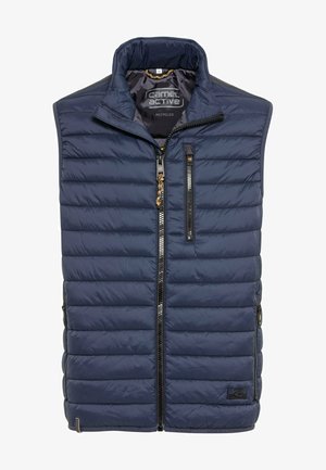 Navy blue insulated vest with diagonal quilted pattern, high collar, front zipper, two zippered side pockets, and branding label.