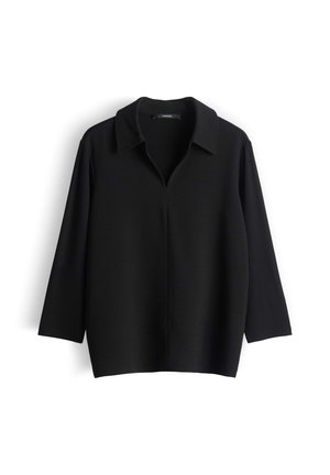 Camicia nera a maniche lunghe con collo, scollo anteriore aperto e vestibilità ampia, mostrata su uno sfondo bianco.