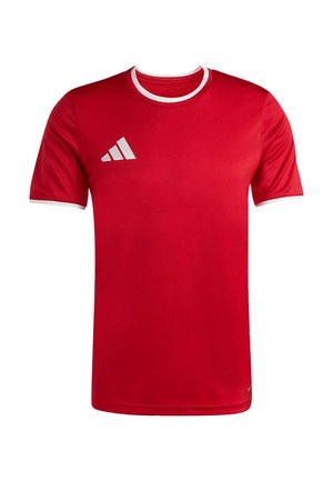 Maillot de sport rouge à manches courtes avec bordure blanche sur le col et les manches, arborant un petit logo blanc à trois bandes sur la poitrine gauche.