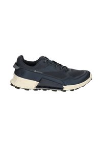 GORE-TEX running shoe in dark navy with a textured upper, cushioned white sole, and black treaded outsole for traction. Detailed with gray accents.