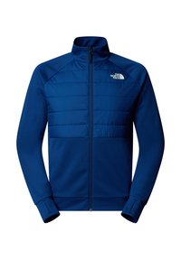 Modrá bunda s předním zipem, texturovaným materiálem na rukávech a polstrováním v oblasti hrudníku. Obsahuje logo The North Face na levém horním rohu.