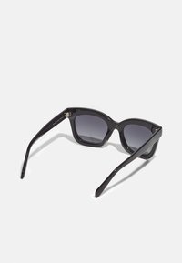 Black sunglasses with a wide, angular frame. Gradient lenses transitioning from dark to light. Glossy finish with sleek, straight temples.
