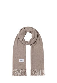 Jasnobrązowy, miękki szalik z frędzlami na końcach i małą białą prostokątną metką "ftc" po jednej stronie, pokazany na płasko i z pętlą na górze.