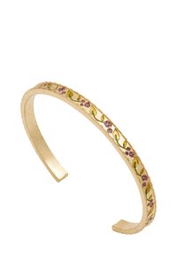 Gold-colored metal cuff bracelet featuring embossed floral designs in purple and green, with a textured edge for added detail.
