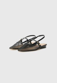 Black slingback shoes with a pointed toe, mesh material, thin straps, gold-tone hardware, and a low heel designed for comfort and breathability.