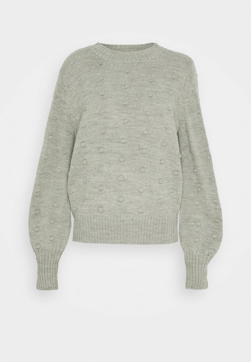 Pull vert clair à col rond, avec des détails en relief de boules et des poignets et un ourlet en côtes. Matière douce avec une coupe décontractée.
