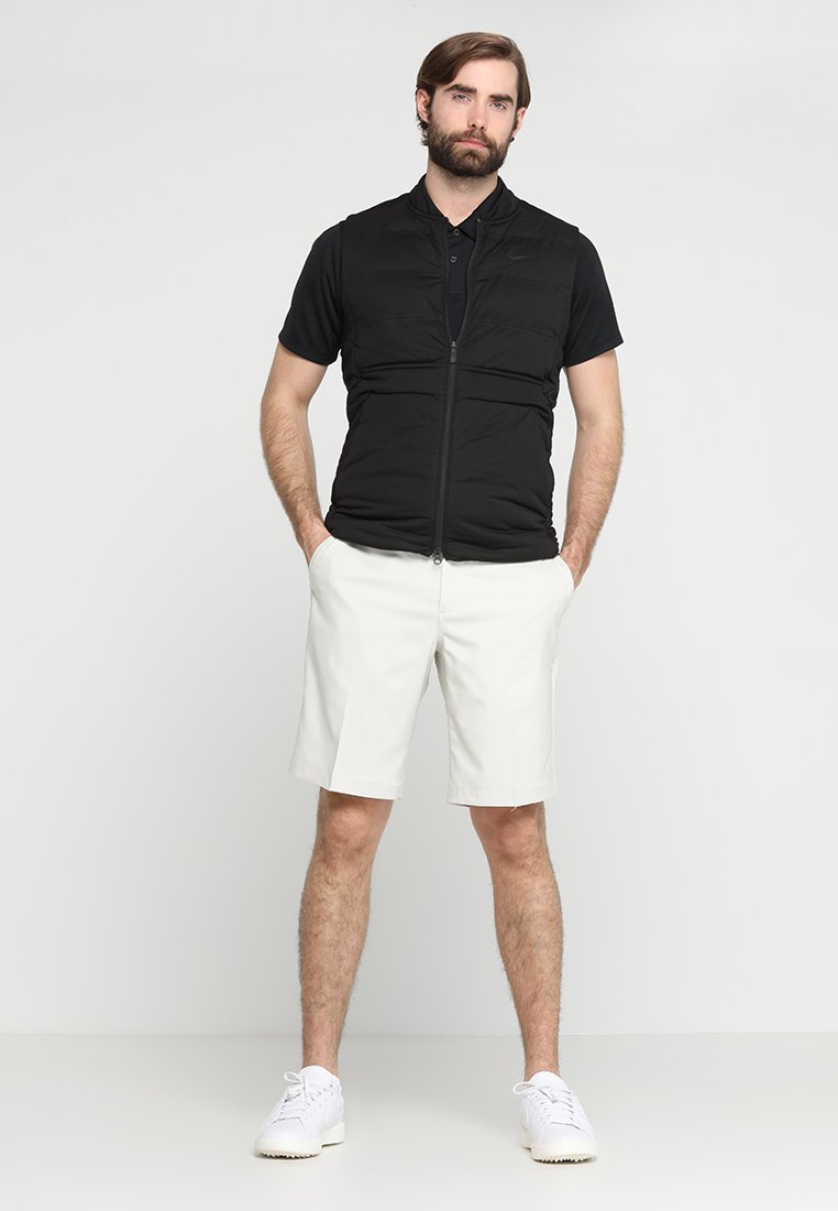 nike dry essential solid polo