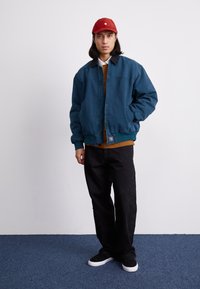 Carhartt WIP SANTA FE JACKET - Light jacket - deep lagoon/black