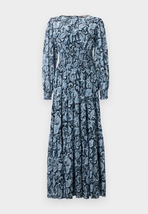 Tumed kleit tumesinisest sinisest helesinise paisleprintiga, millel on pikad varrukad, kokkuvõtva bodice ja kihiline seeliku disain.