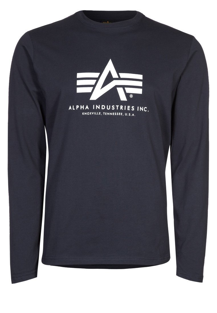 Marineblauwe longsleeve shirt met wit Alpha Industries logo en de tekst "ALPHA INDUSTRIES INC. KNOXVILLE, TENNESSEE, U.S.A." op de borst.