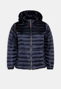 Marineblaue Steppjacke mit Reißverschluss vorne, Kapuze und gerippten Bündchen. Verfügt über eine glatte, glänzende Oberfläche und dezente horizontale Steppnähte.