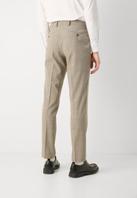 BOSS HUGE - Uzvalks - open beige