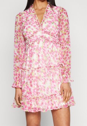 Floral dress featuring a pink and white pattern, layered design, ruffled accents, long sleeves, and a deep V-neckline. Lightweight fabric.