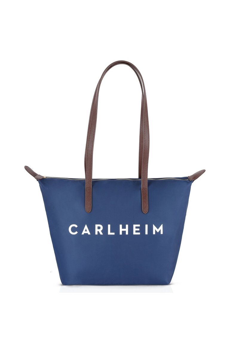 Sac cabas bleu marine avec fermeture éclair, anses en cuir marron et logo "CARLHEIM" blanc. Texture lisse et design rectangulaire.