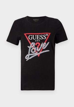 Svart bomull T-skjorte med en rød trekantlogo med "GUESS U.S.A." og en krystallbesatt "Love"-tekstdesign i hvitt. Korte ermer.