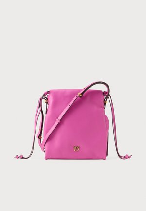 Pink leather crossbody bag with a smooth texture, gold hardware, a detachable shoulder strap, and a logo accent at the front.