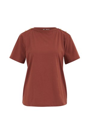 Kortærmet skjorte i rustfarve med rund halsudskæring og gyldne knapper langs skuldersømmene på hvid baggrund.