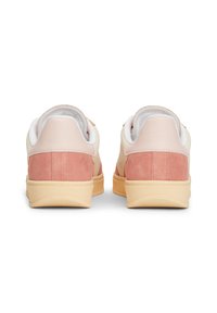 Pink and cream suede sneakers with a cushioned collar, smooth leather accents, and a light rubber sole. Rear view highlights color blocking.