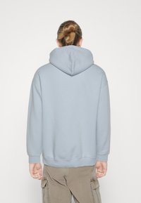 LOW LIGHTS STUDIOS® Mikina s kapucí - light blue