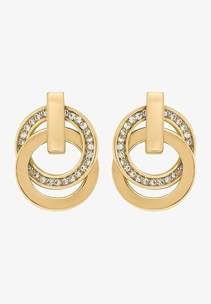 Paire de boucles d'oreilles double anneau doré, un anneau lisse et l'autre orné de petits cristaux clairs, avec des attaches rectangulaires à clous.