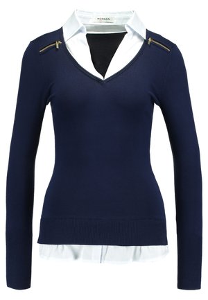 Navy sweater with long sleeves and V-neck, featuring a white collar and zip accents on the shoulder. Soft knit material, fitted design.