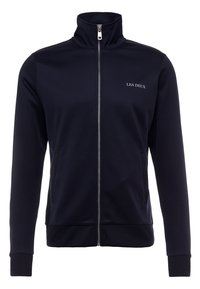 Námornická modrá zipová bunda s vysokým límcem, ribovanými manžetami a lemem, bočními kapsami a logem "LES DEUX" na levé hrudi.