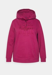 Fuksjowy pulower z kapturem, z kieszenią typu kangur i ściągaczem na kapturze, oraz haftowanym logo "Hilfiger" w kontrastowym kolorze. Miękka tkanina.