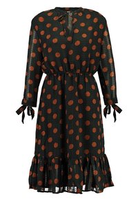 Černé šaty s oranžovými puntíky, se zavazovacím výstřihem, dlouhými rukávy se zavazovacími detaily a volánkovým zakončením. Vyrobené z lehké textilie.