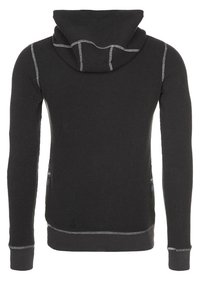 Schwarzer Waffelstrick-Hoodie mit langen Ärmeln, sichtbaren grauen Nahtakzenten und einer leicht lockeren Kapuze, von hinten gezeigt.