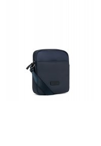 Borsa a tracolla blu navy realizzata in tessuto texturizzato, dotata di chiusura con zip, tracolla regolabile e una piccola tasca frontale con etichetta del marchio.