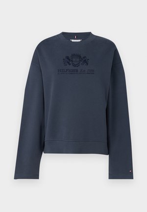 Mörkblå sweatshirt i mjukt material, med rund halsringning, långa ärmar och broderad logotypdetalj i mitten.