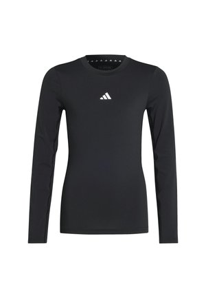 Zwarte, lange mouwen sportshirt gemaakt van soepel, rekbaar materiaal. Heeft een klein wit logo op de borst. Eenvoudig ontwerp met ronde hals.