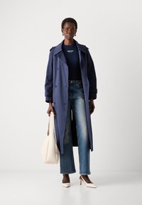 Tommy Jeans CLEO - Bootcut jeans - denim dark