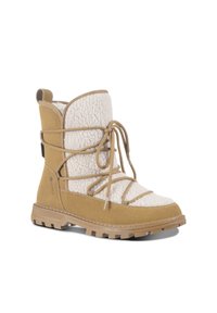 Suiden tan ja vaaleanbeige shearling-mittapohjan saapas, jossa on nauhakuormitus, teksturoitu pinta, vahvistettu varvaskuppi ja paksu kumipohja pidon takaamiseksi.