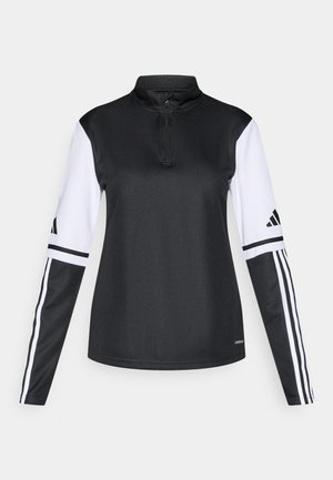 Black and white athletic pullover with a quarter zip, long sleeves featuring white side stripes and a logo on the upper arm. Smooth texture.