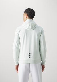 EA7 Emporio Armani Mikina so zipsom - ghiaccio
