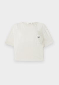 Korte, cropped t-shirt met korte mouwen in off-white katoen. Heeft een voorzak met een geprint logo en een ronde halslijn. Soepele textuur.