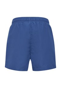 Blå simshorts i lättviktsmaterial med elastisk midja. Har en slät yta och inga synliga mönster eller markeringar.