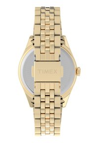 Montre-bracelet en acier inoxydable doré avec un bracelet à maillons, un boîtier rond et un cadran blanc. Présente un logo gravé et des détails de résistance à l'eau.