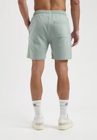 HANG ELEVEN Trainingsbroek - sage green