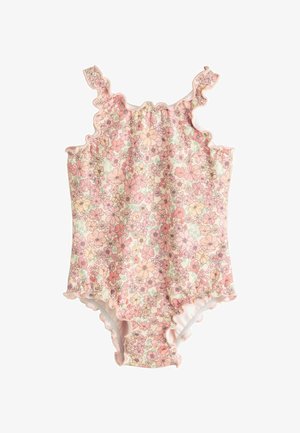 Costume intero floreale in rosa chiaro, con spalline e bordi arricciati. Il motivo include fiori pastello e dettagli verdi. Tessuto morbido.