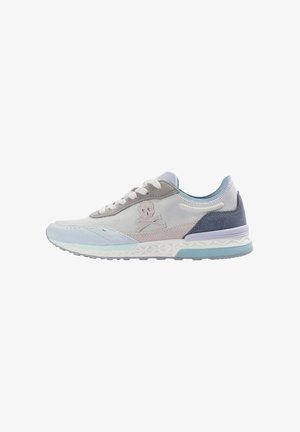 Light blue and gray athletic shoe with mesh and suede. Features a skull logo, white laces, and textured sole with a distinct pattern.