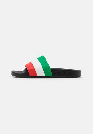 Black slide sandal with a wide strap featuring textured red, white, and green horizontal stripes across the top.